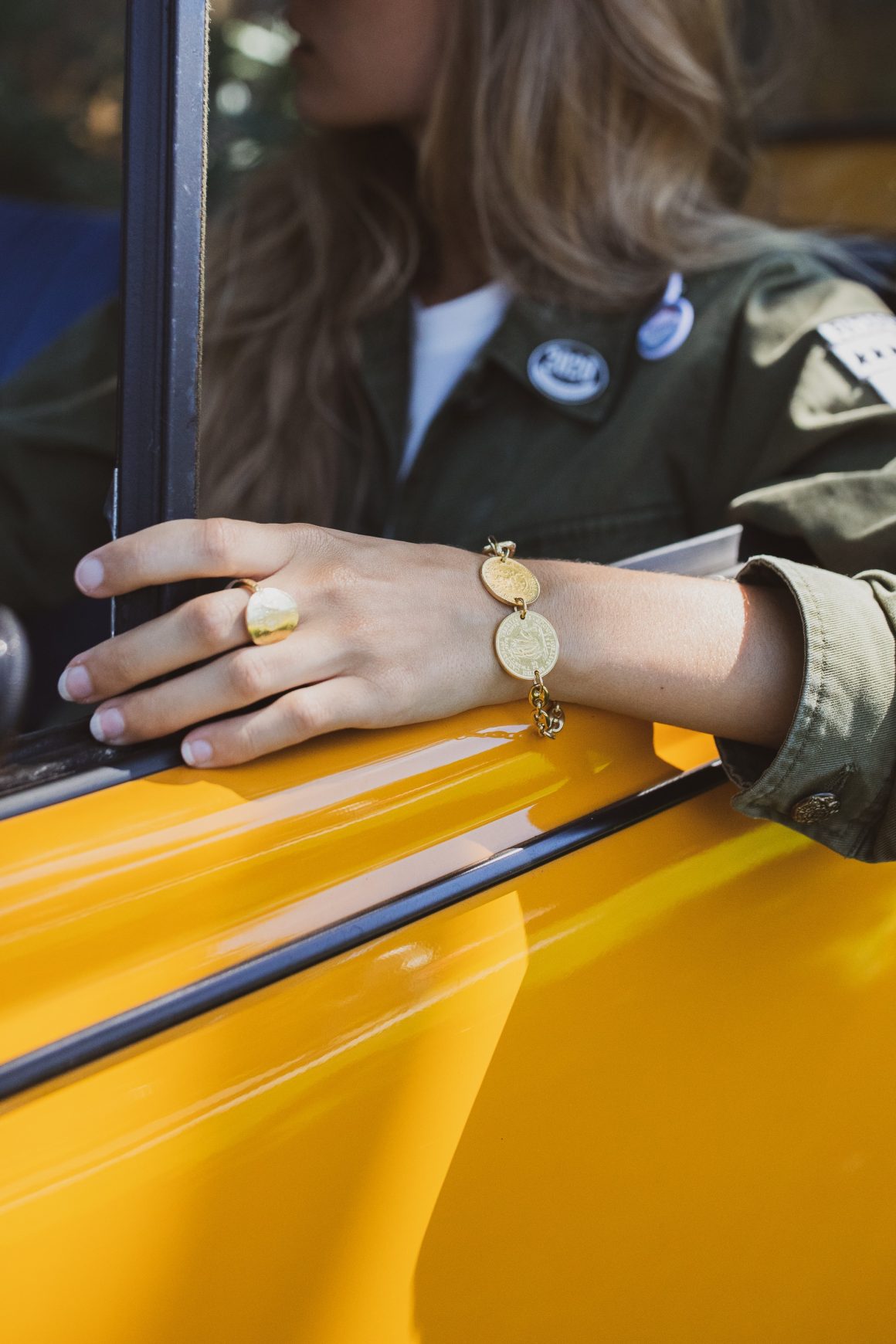 Veste militaire Golden Goose et bracelet en vermeil Tant d'Avenir